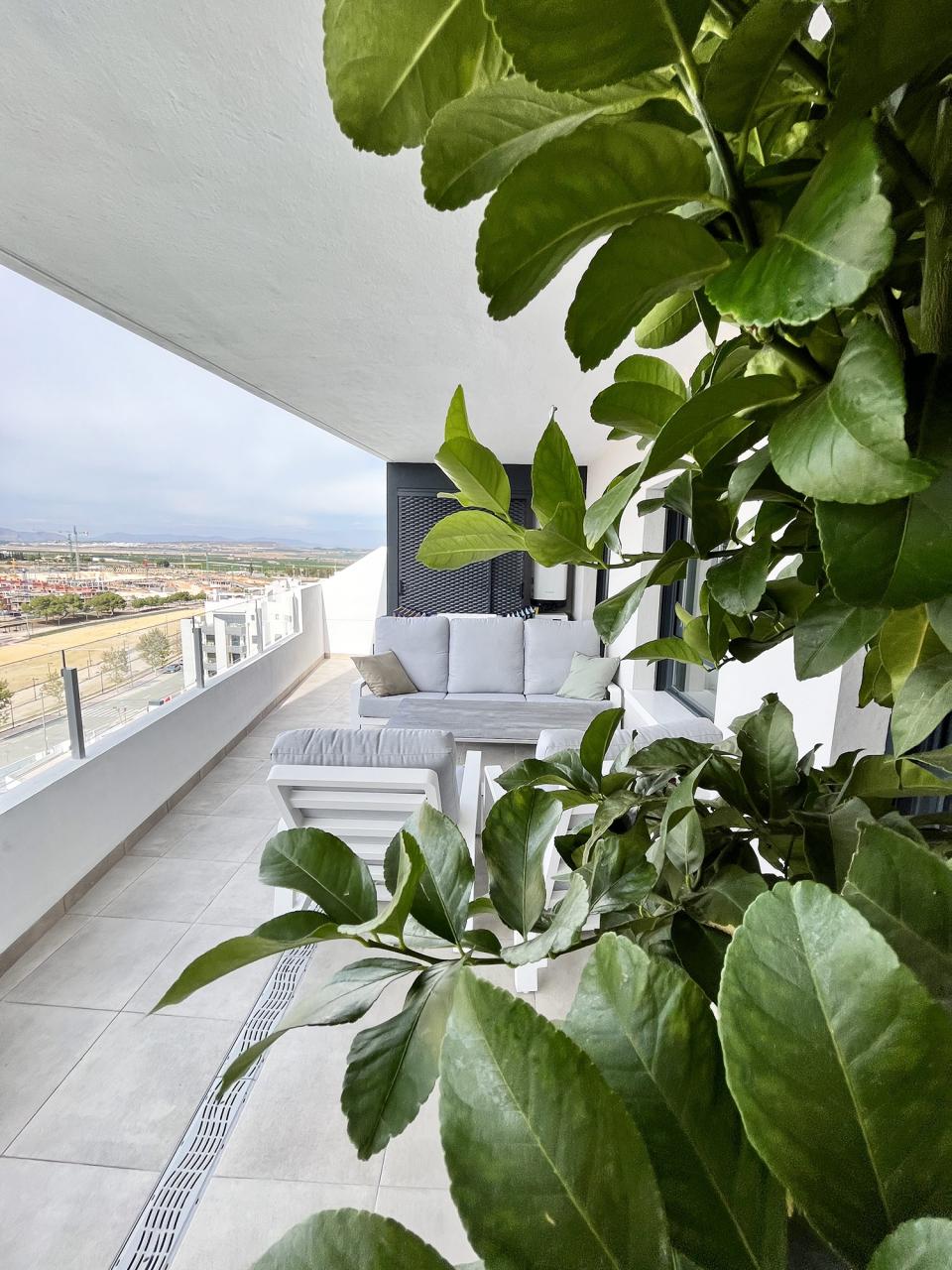 A huge terrace with a&nbsp;view of the entire resort and the vast park and sunset